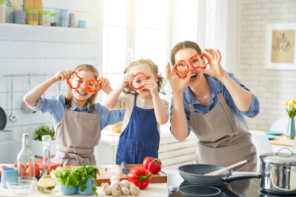 istock Happy family in the kitchen. 1148183726