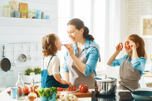 istock Happy family in the kitchen. 1148183812