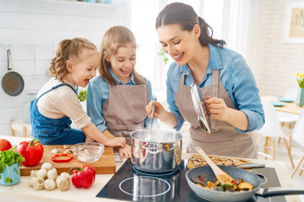istock Happy family in the kitchen. 1148183828