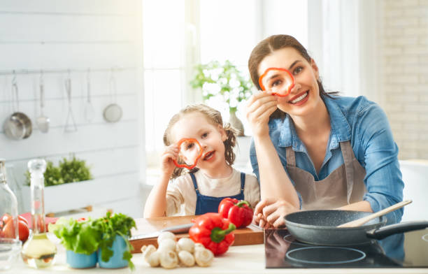 istock Happy family in the kitchen. 1148183847