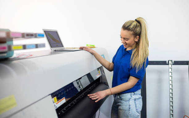 istock Female worker in printing factory 1148186027