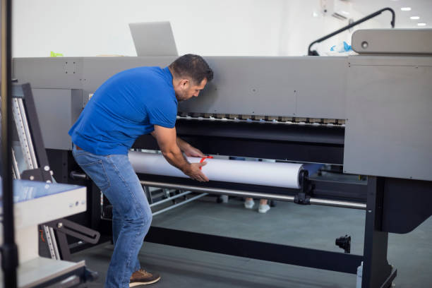 istock Coworkers in printing factory 1148186065