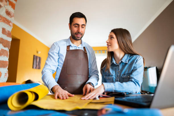 istock Cooperation Between The Craftsman And The Designer 1148186606