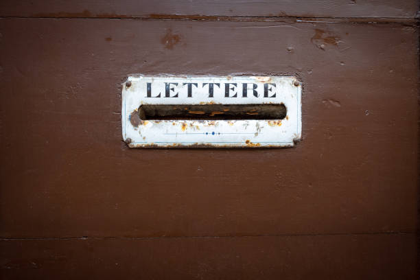 istock typical mailbox in a wooden door in Italy 1148187557
