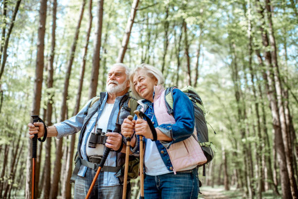 istock Senior couple hiking in the forest 1148188343