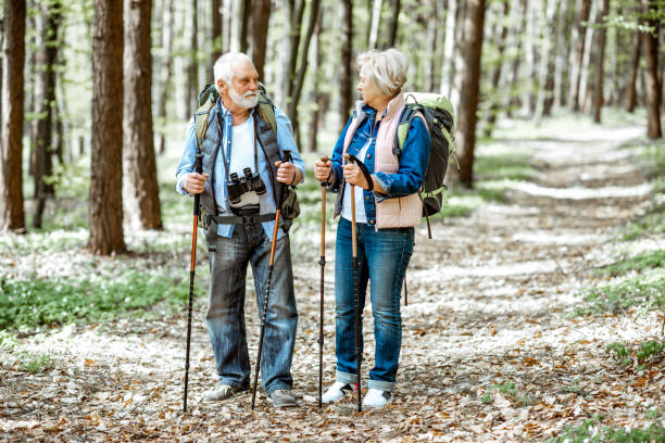 istock Senior couple hiking in the forest 1148188351