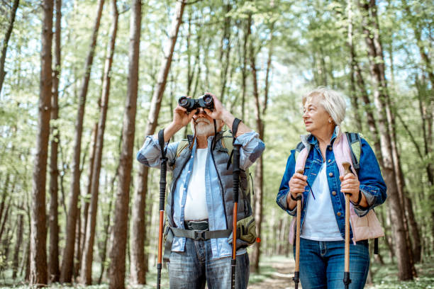 istock Senior couple hiking in the forest 1148188355