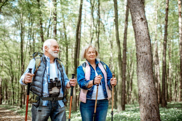 istock Senior couple hiking in the forest 1148188369