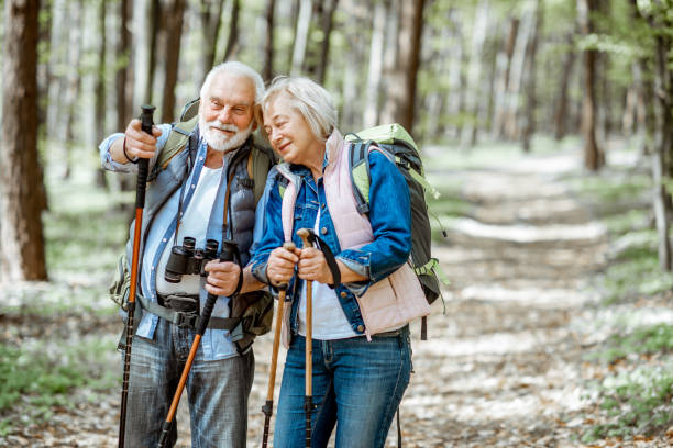 istock Senior couple hiking in the forest 1148188427