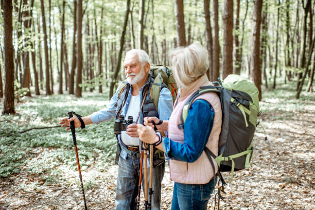 istock Senior couple hiking in the forest 1148188428