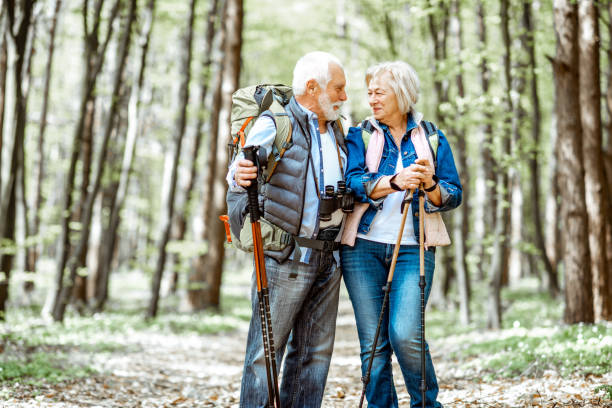 istock Senior couple hiking in the forest 1148188529