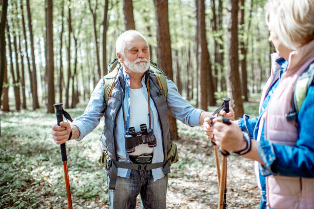 istock Senior couple hiking in the forest 1148188548