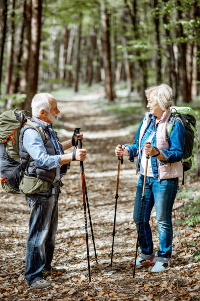 istock Senior couple hiking in the forest 1148188556