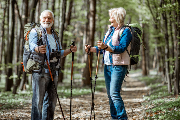 istock Senior couple hiking in the forest 1148188574