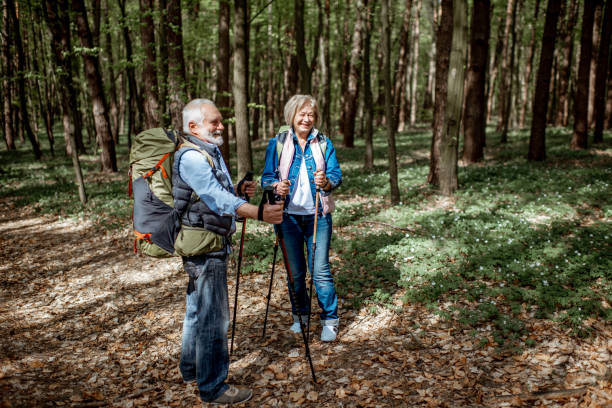 istock Senior couple hiking in the forest 1148188579