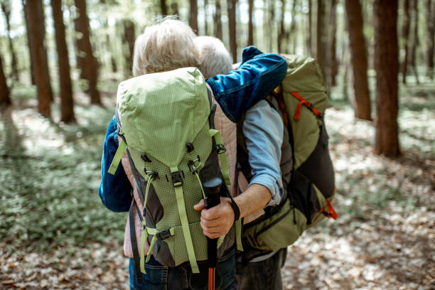 istock Senior couple hiking in the forest 1148188587