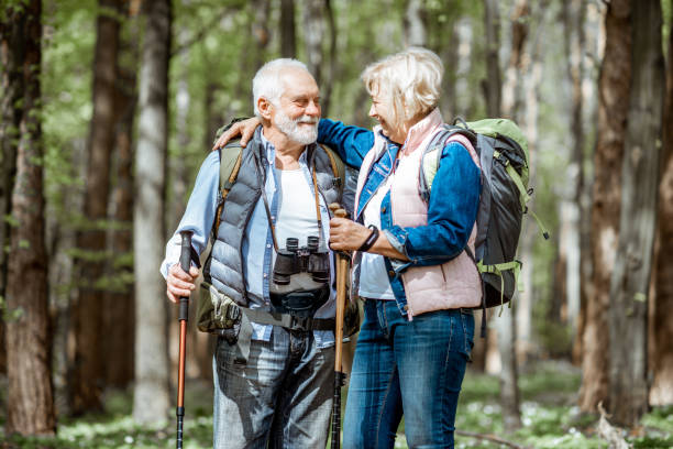 istock Senior couple hiking in the forest 1148188619