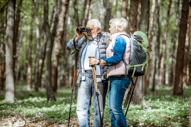 istock Senior couple hiking in the forest 1148188631