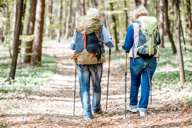 istock Senior couple hiking in the forest 1148189223