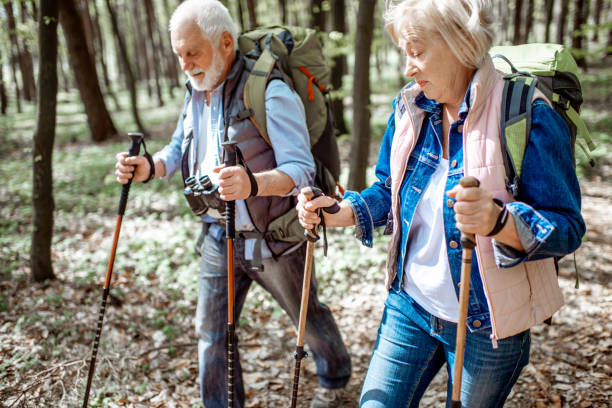 istock Senior couple hiking in the forest 1148189314