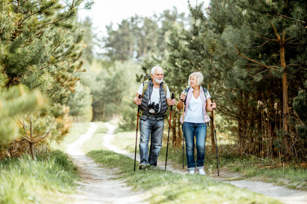 istock Senior couple hiking in the forest 1148190872