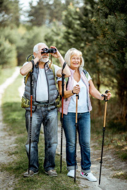 istock Senior couple hiking in the forest 1148190922