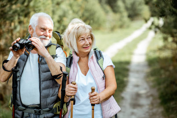 istock Senior couple hiking in the forest 1148190936