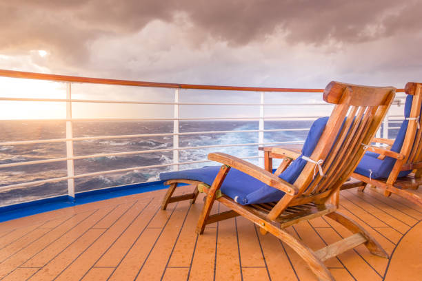 Lounging chair on a cruise ship Lounging chair on a cruise ship looking to the horizon boat deck stock pictures, royalty-free photos & images