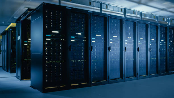 istock Shot of Data Center With Multiple Rows of Fully Operational Server Racks. Modern Telecommunications, Cloud Computing, Artificial Intelligence, Database, Super Computer Technology Concept. 1148195956