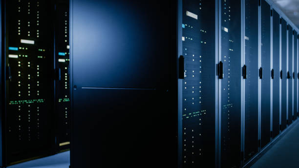 istock Shot of Data Center With Multiple Rows of Fully Operational Server Racks. Modern Telecommunications, Cloud Computing, Artificial Intelligence, Database, Super Computer Technology Concept. 1148195995