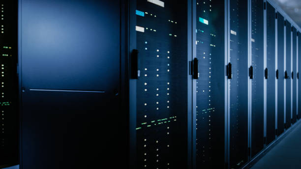 istock Shot of Data Center With Multiple Rows of Fully Operational Server Racks. Modern Telecommunications, Cloud Computing, Artificial Intelligence, Database, Super Computer Technology Concept. 1148196104