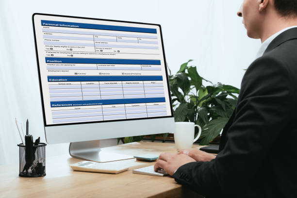 istock cropped view of man filling in Personal Information Application Identity Private Concept 1148200034