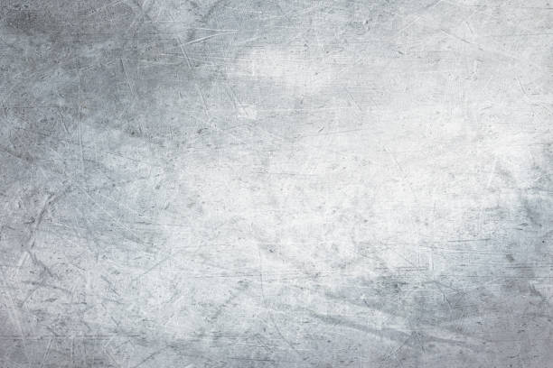 Scratched grunge texture with old,dusty and dirty gray surface.Retro vintage background.