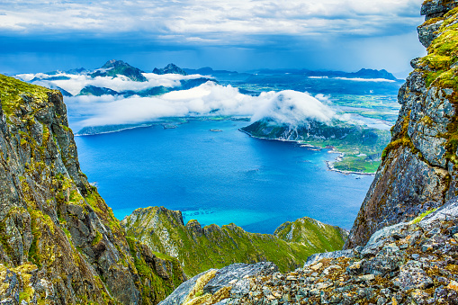 Breathtaking mountain scenery of the cloudy Lofoten Islands, Norway