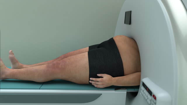 obesity - man gets stuck in an MRI machine
