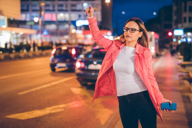 istock Searching for a taxi vehicle 1148205836