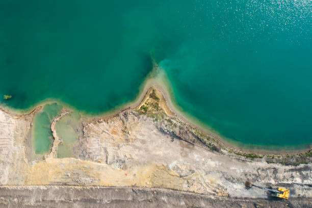 istock Sand and gravel pit, lakeshore - aerial view 1148206811