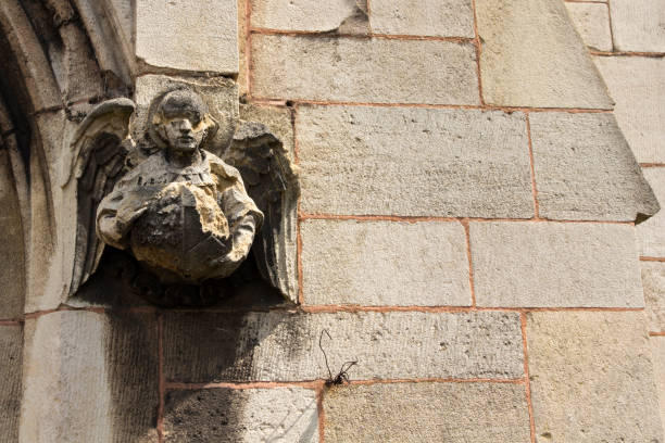 istock Angel sculpture on church wall 1148208117