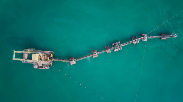istock Sand and gravel pit, large dredger  - aerial view 1148208257