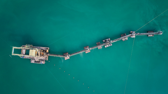 Sand and gravel pit, large dredger  - aerial view