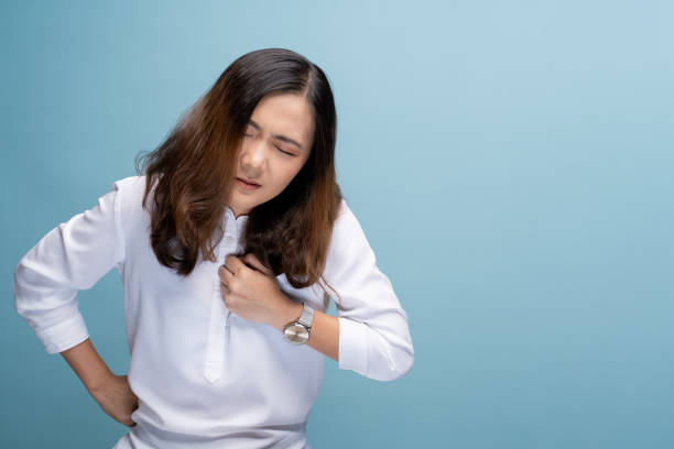 istock Woman has eyes pain isolated over blue background 1148208313