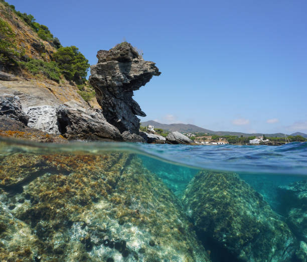 istock Spain seashore rock formation and rocks underwater 1148208384