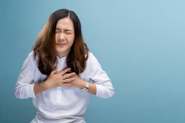 istock Woman has eyes pain isolated over blue background 1148208499