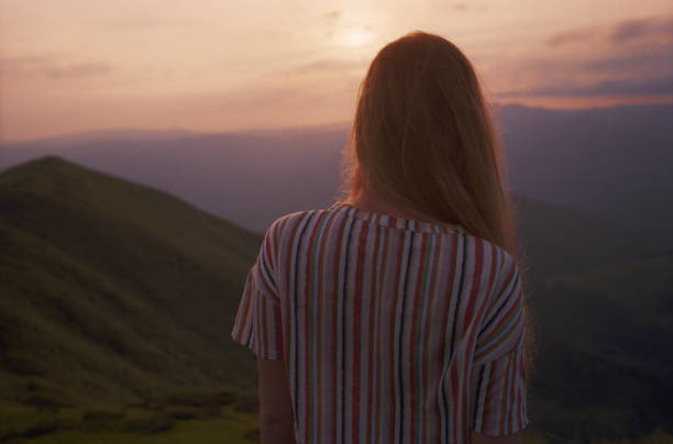 istock Young woman looking at the Carpathian mountains 1148208559
