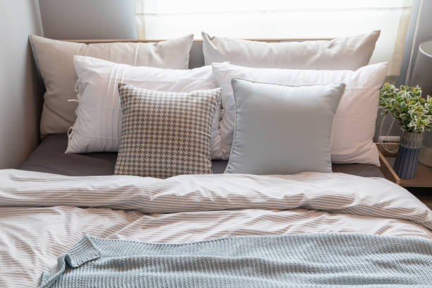 istock modern bedroom with set of pillows 1148211833