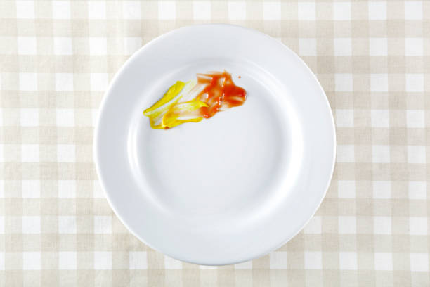 istock Plate with mustard and ketchup stains 1148214960