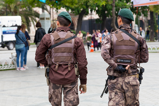 Istanbul, Turkey - May 09 2019: Two soldiers of the special forces (Özel harekat) patrolling the street.