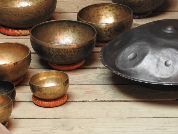 istock Tibetan singing bowl and other religious ritual instruments for meditation. 1148216184