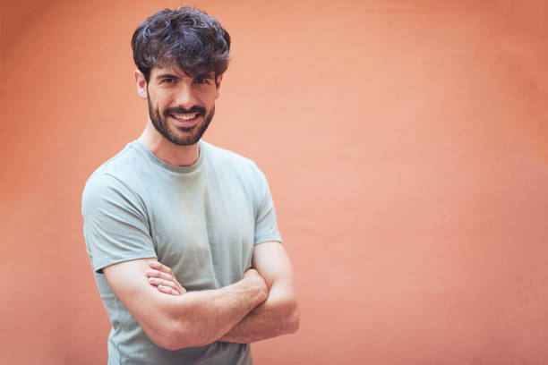 istock Young man looking at camera and smiling. 1148216894
