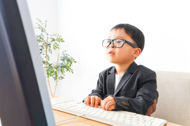 istock Child businessman working at office 1148217949